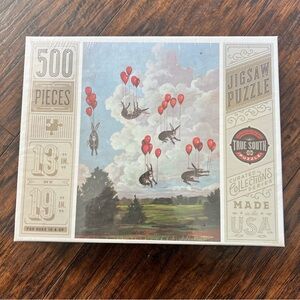 True South 500 piece jigsaw puzzle Artist Elizabeth Foster bunnies and balloons